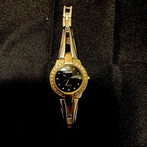 Seiko watch with stones.